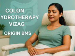 Indian woman relaxed in wellness clinic during colon hydrotherapy session in Vizag at Origin BMS